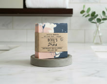 Load image into Gallery viewer, Pink, dark grey and white swirled soap on a soap dish