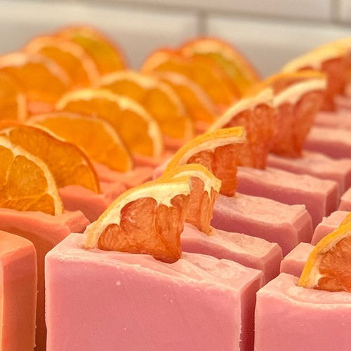 pink grapefruit vegan soaps with dried fruit decoration