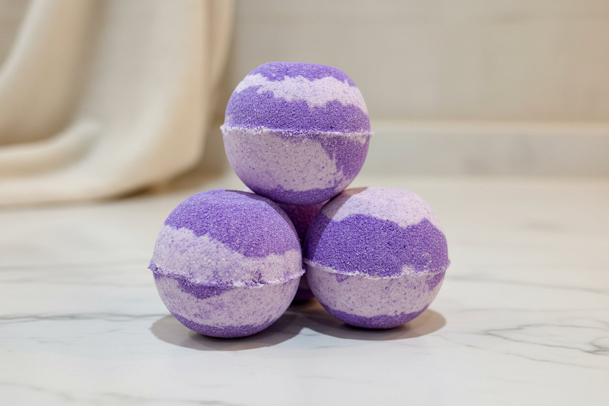 Stack of two tone purple bath bombs 