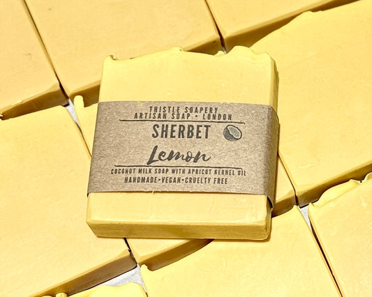 Yellow soap bar with a label on a yellow background
